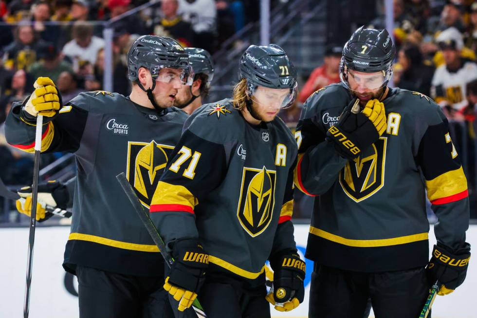 Golden Knights centers Ivan Barbashev (49), William Karlsson (71) and defenseman Alex Pietrange ...