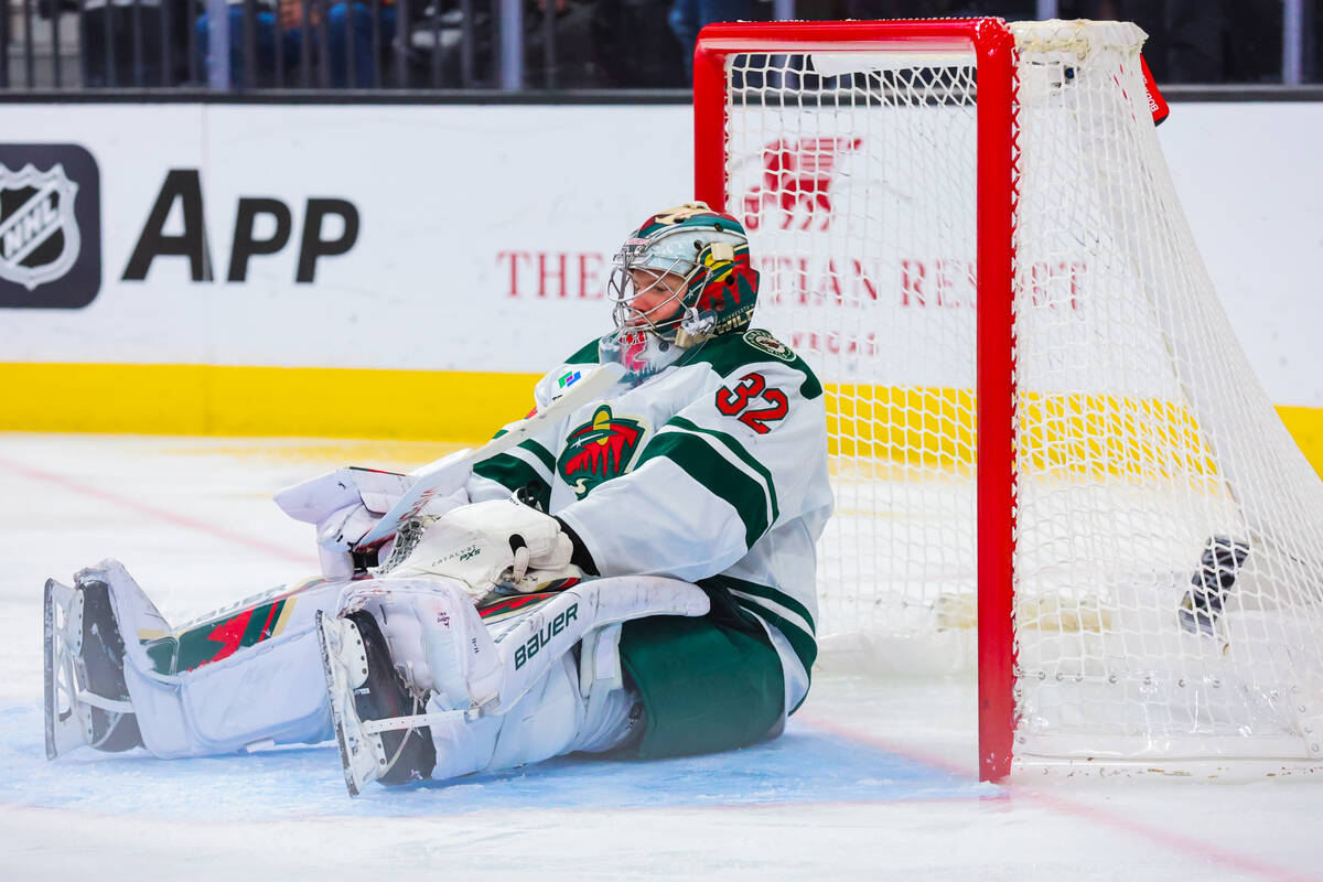 Minnesota Wild goaltender Filip Gustavsson (32) sits on the ice in defeat after allowing a thir ...