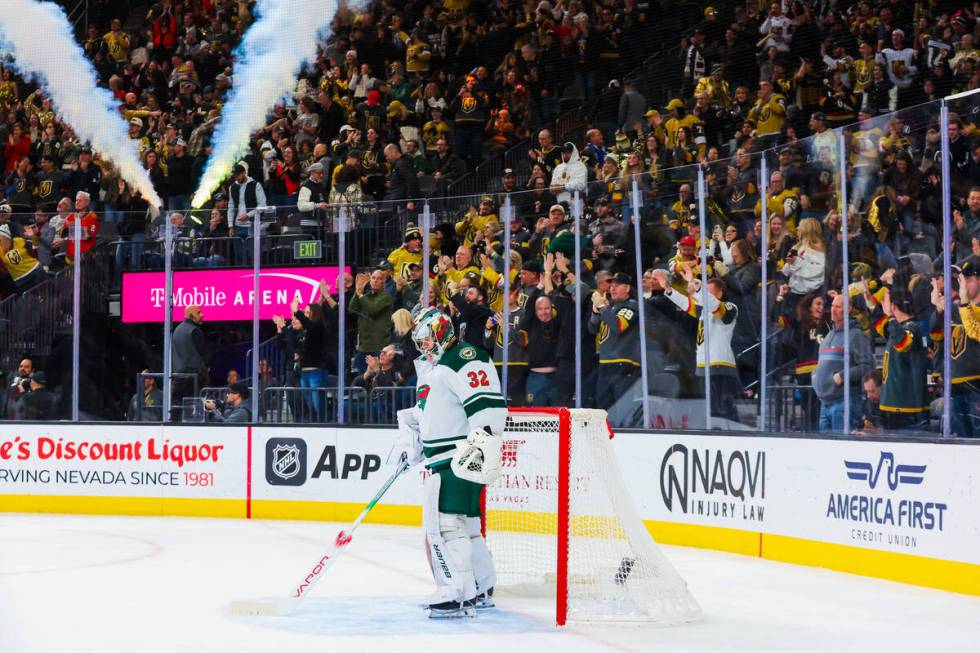 Minnesota Wild goaltender Filip Gustavsson (32) looks down at the ice as Golden Knights fans ce ...