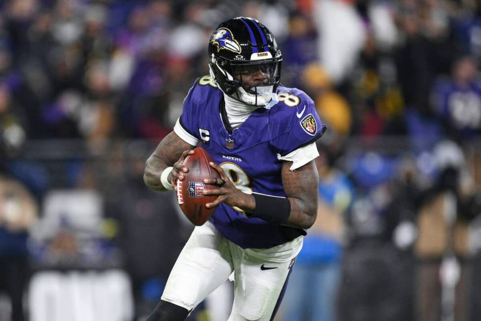 Baltimore Ravens quarterback Lamar Jackson (8) looks to pass the ball during the second half of ...