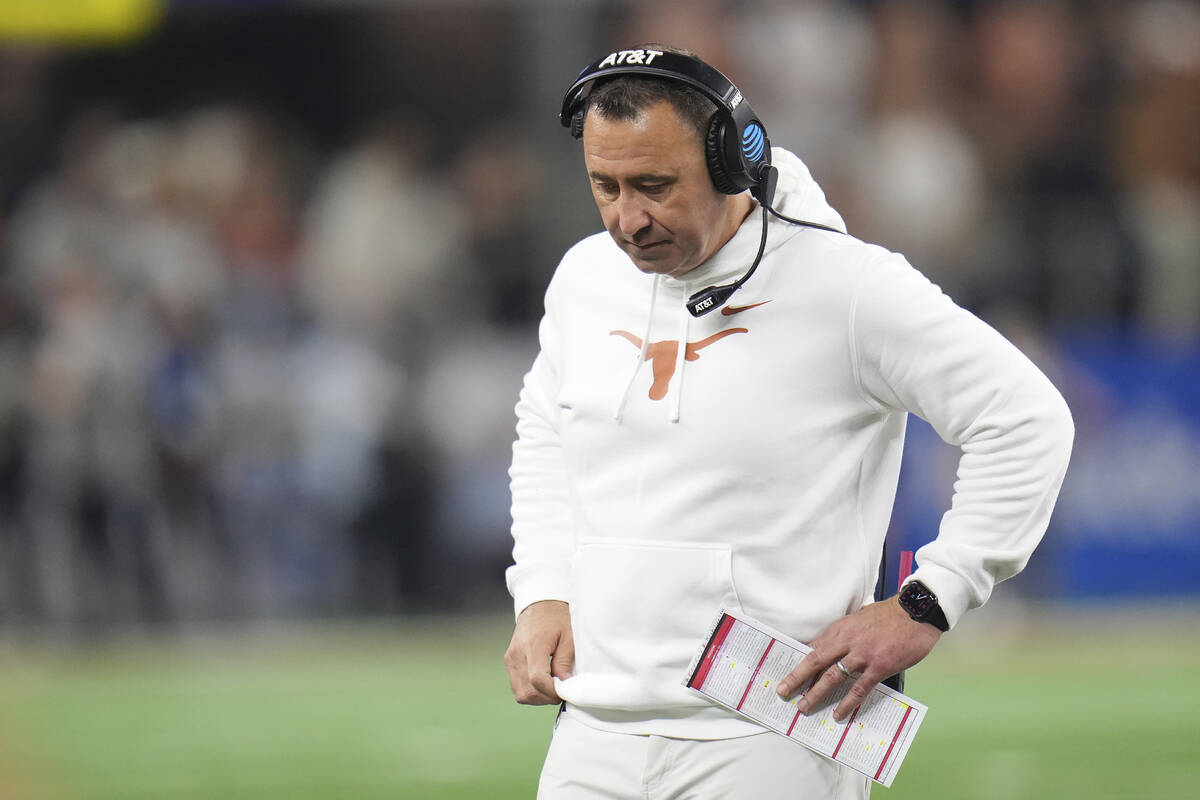 Texas head coach Steve Sarkisian reacts during the second half of the Cotton Bowl College Footb ...