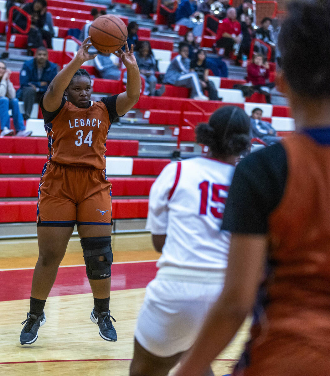 Legacy's Iyanais Vincent (34) gets off a three-point shot against Valley's Laneice Rodgers (15) ...