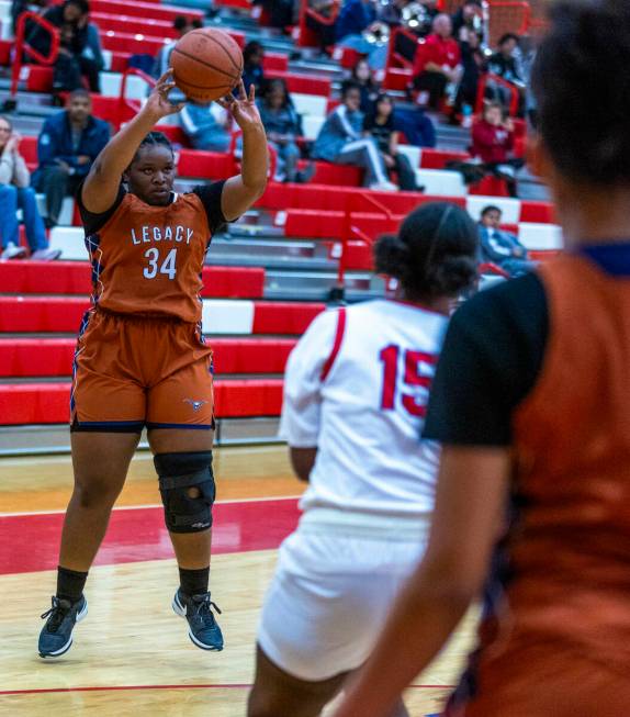 Legacy's Iyanais Vincent (34) gets off a three-point shot against Valley's Laneice Rodgers (15) ...