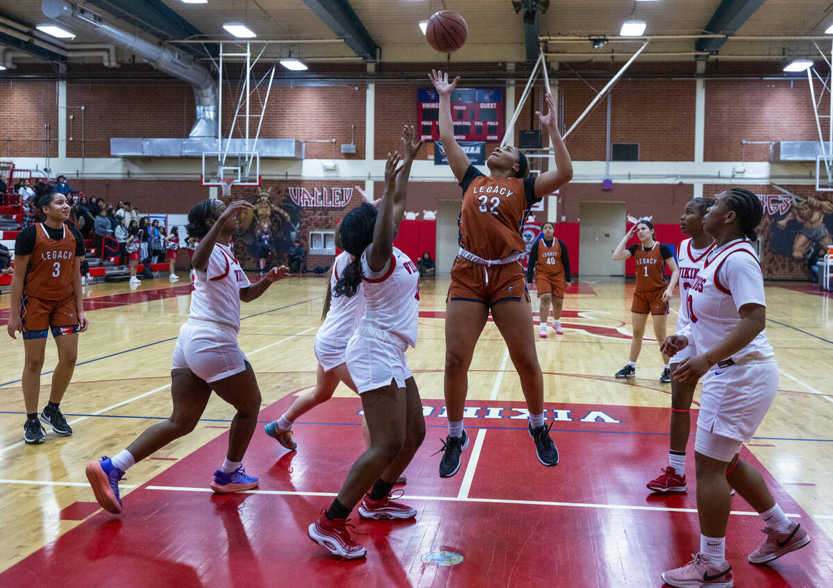 Legacy's Ajalee Williams (32) looks to secure a rebound against all Valley players during the f ...