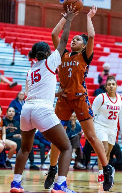 Legacy's Laila Gines (3) posts up over Valley's Laneice Rodgers (15) during the second half of ...