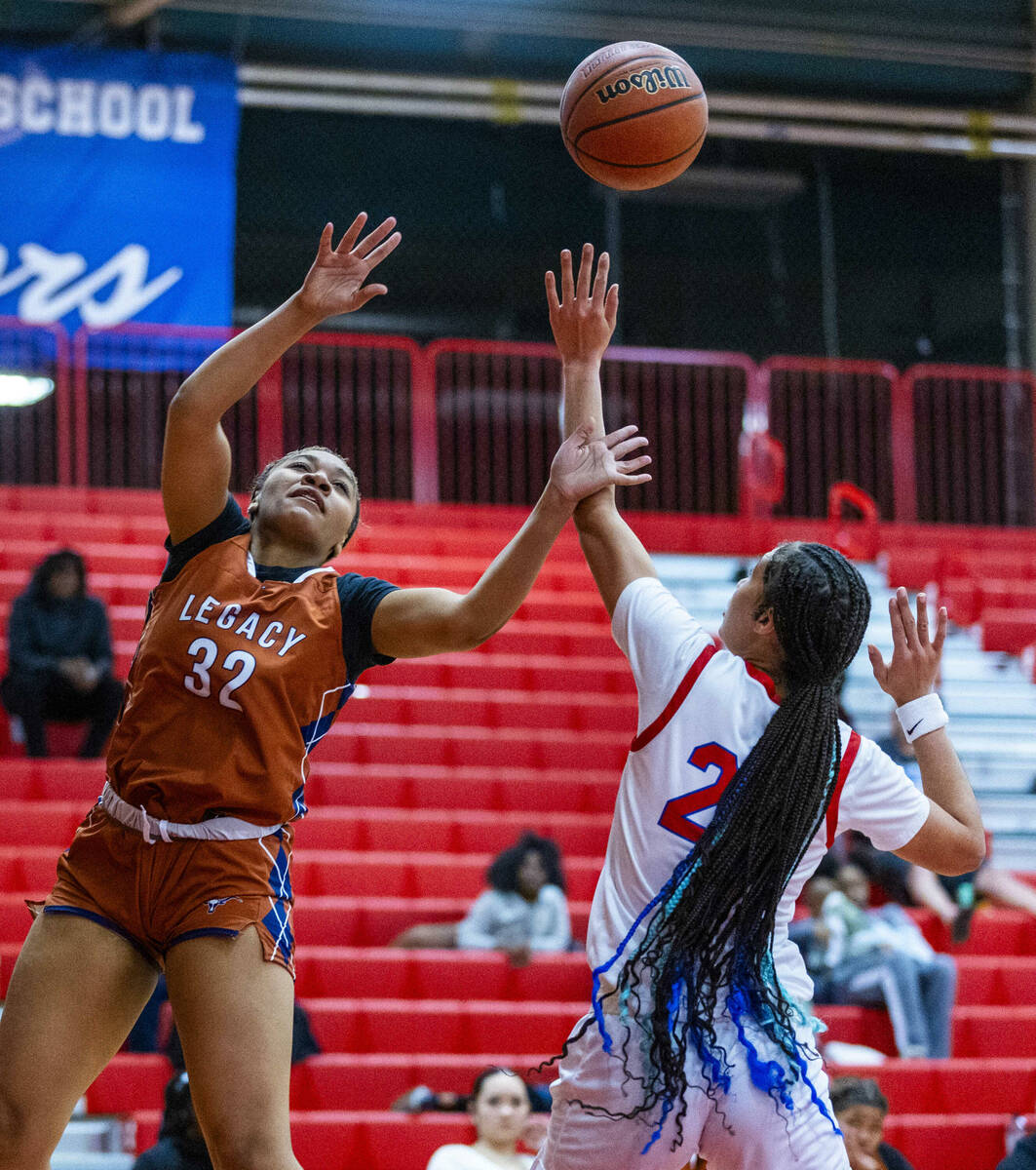 Legacy's Ajalee Williams (32) battles for a loose ball with Valley's Jennifer Hughes (20) durin ...