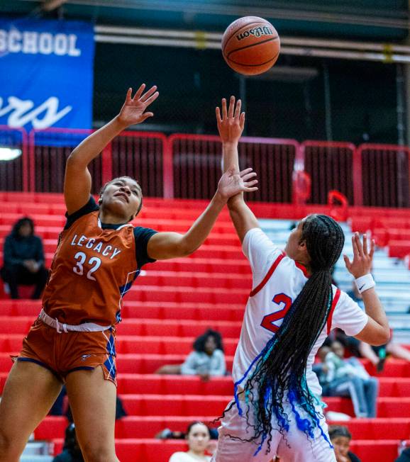 Legacy's Ajalee Williams (32) battles for a loose ball with Valley's Jennifer Hughes (20) durin ...