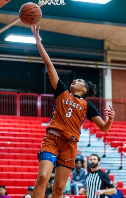 Legacy's Laila Gines (3) lays in a basket against Valley's defense during the second half of th ...