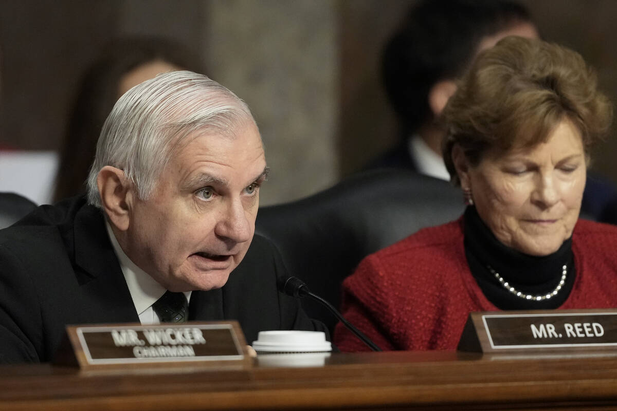 Sen. Jack Reed, D-R.I., the committee ranking member, left, speaks during the Senate Armed Serv ...