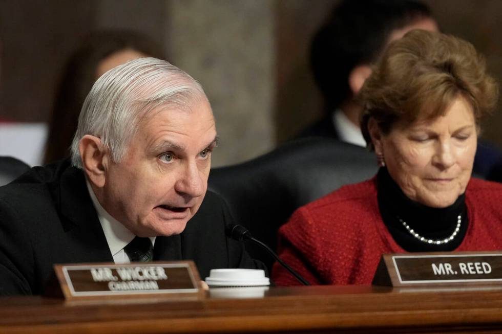 Sen. Jack Reed, D-R.I., the committee ranking member, left, speaks during the Senate Armed Serv ...