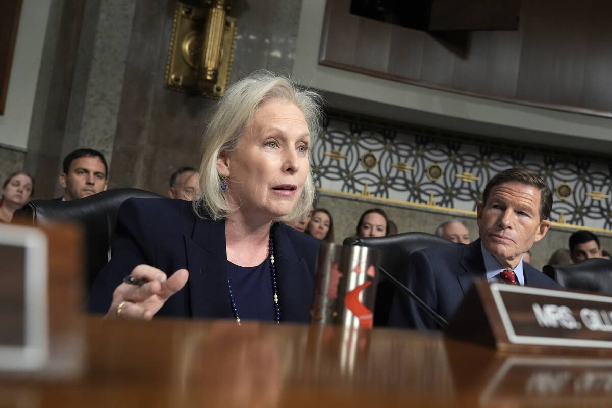 Sen. Kirsten Gillibrand, D-N.Y. speaks as Sen. Richard Blumenthal, D-Conn., right, listens at t ...