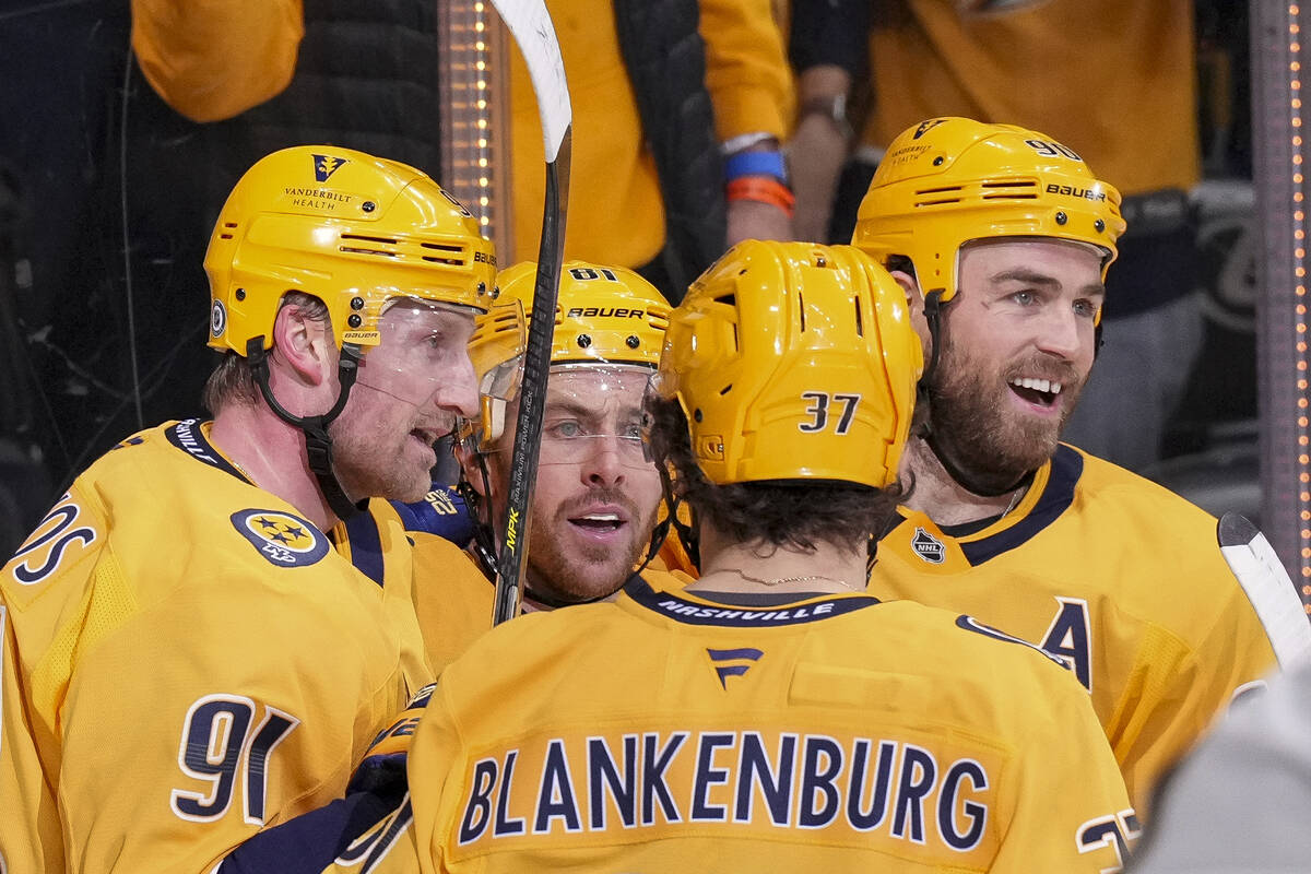 Nashville Predators center Steven Stamkos (91) celebrates his goal with teammates Jonathan Marc ...