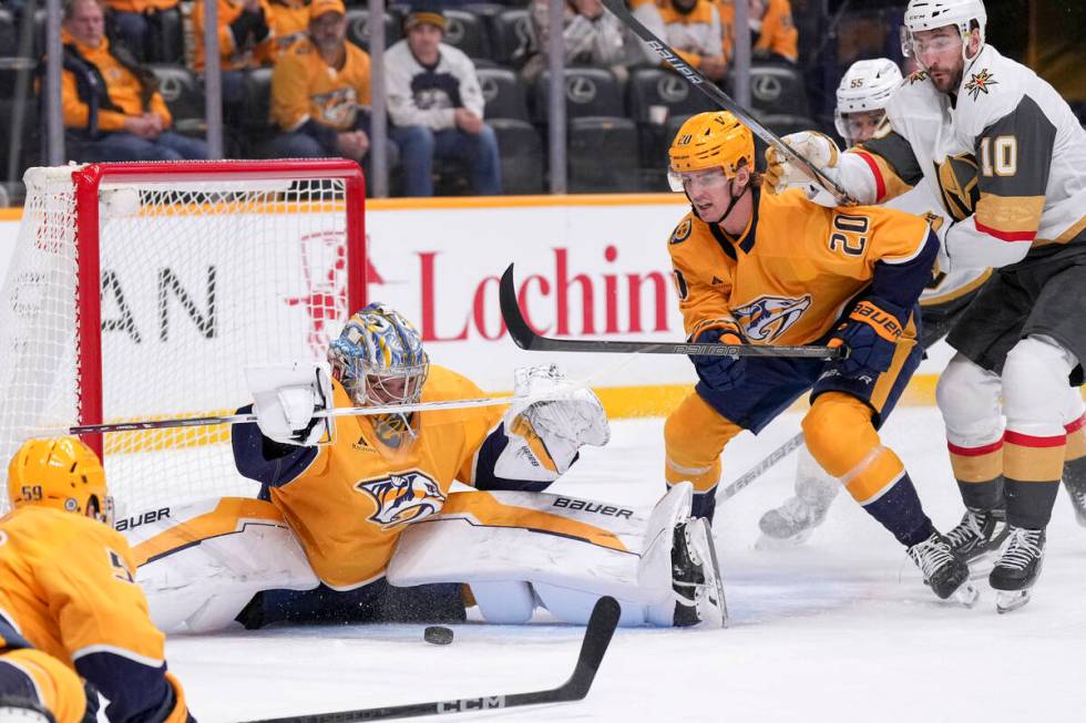 Nashville Predators goaltender Justus Annunen (29) defends the goal during the third period of ...