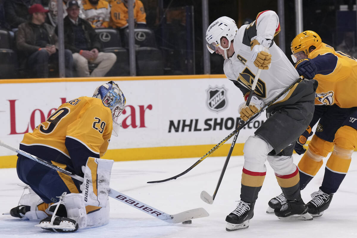 Nashville Predators goaltender Justus Annunen (29) blocks a shot on goal by Vegas Golden Knight ...