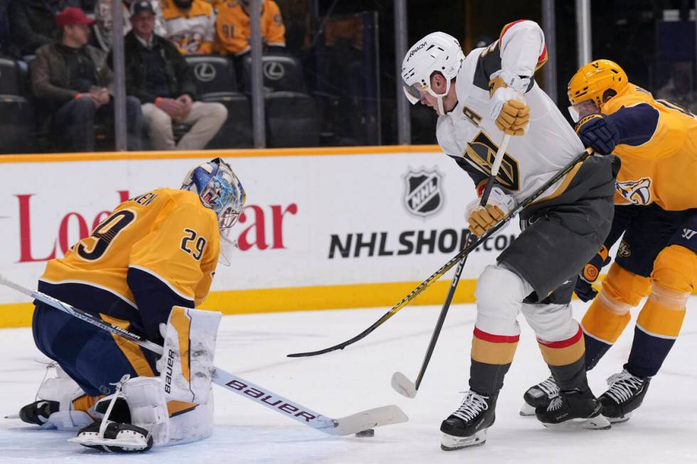 Nashville Predators goaltender Justus Annunen (29) blocks a shot on goal by Vegas Golden Knight ...