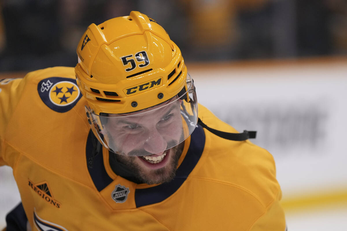 Nashville Predators defenseman Roman Josi (59) warms up for the team's NHL hockey game against ...