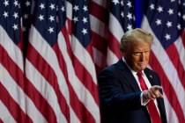 Donald Trump points to the crowd at an election night watch party. (AP Photo/Julia Demaree Nikh ...