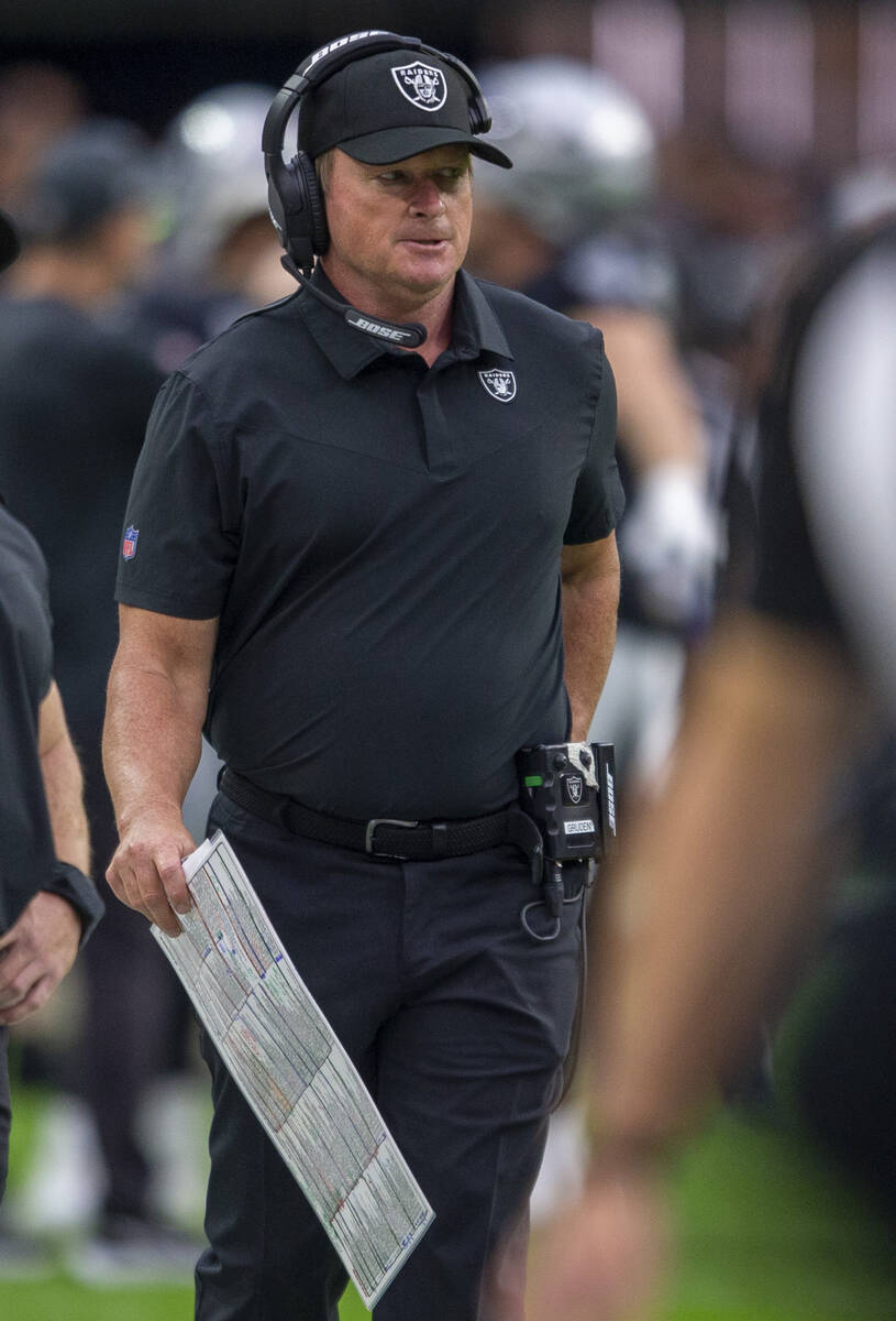 Raiders head coach Jon Gruden looks on from the sideline during the second quarter of an NFL fo ...