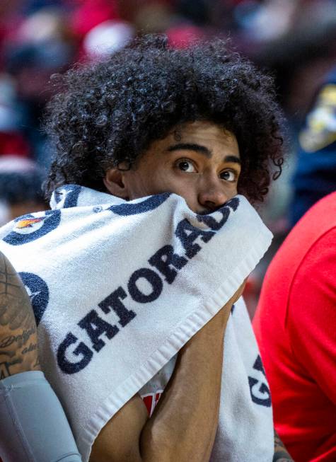 UNLV forward Jalen Hill (1) is concerned on the bench as the Utah State Aggies pull ahead durin ...