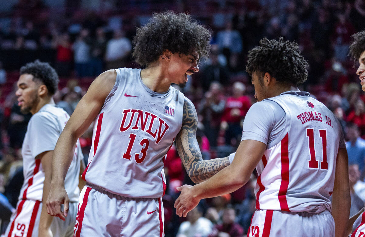 UNLV guard Brooklyn Hicks (13) is pumped about a basket and foul for UNLV guard Dedan Thomas Jr ...