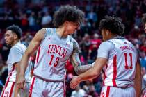 UNLV guard Brooklyn Hicks (13) is pumped about a basket and foul for UNLV guard Dedan Thomas Jr ...