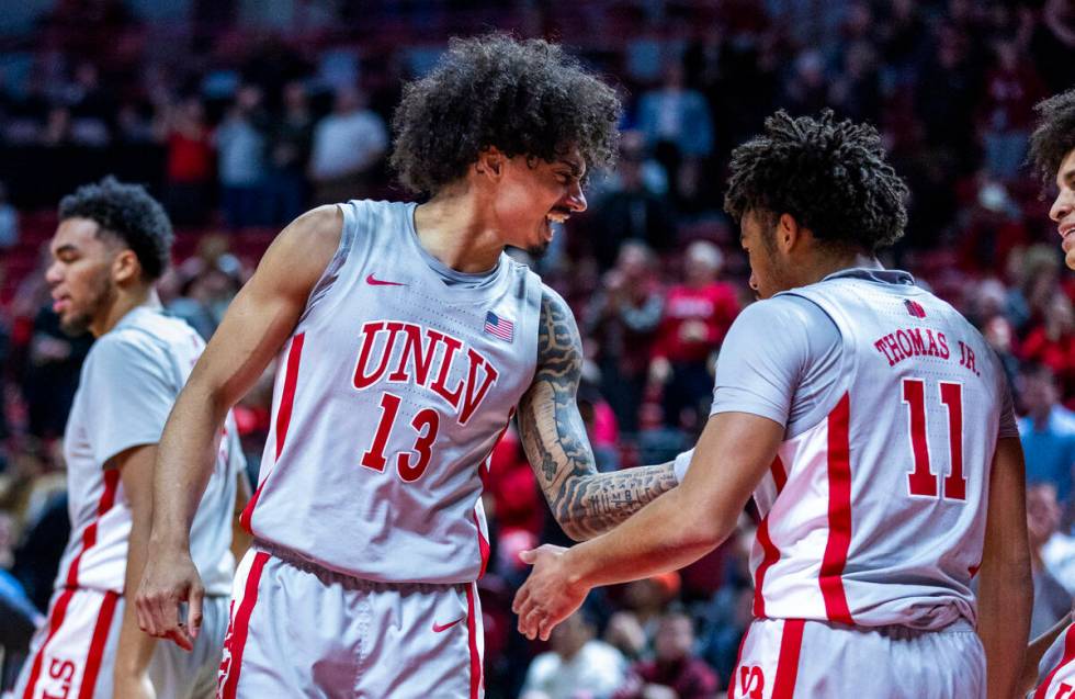 UNLV guard Brooklyn Hicks (13) is pumped about a basket and foul for UNLV guard Dedan Thomas Jr ...