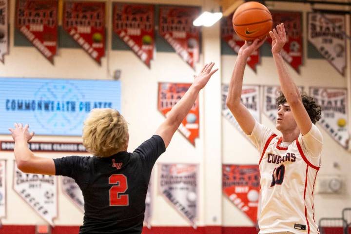 Coronado senior Mason Abittan (10) attempts a shot during the high school basketball game again ...