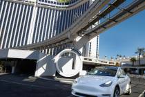 A Tesla with passengers leaves the Westgate's Vegas Loop station, an underground transportation ...