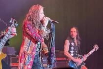 Steven Tyler of Aerosmith and Nuno Bettencourt perform at Janie's Fund charity show on Sunday, ...