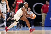 Chicago Sky's Dana Evans looks to start a fast break during a WNBA basketball game against the ...