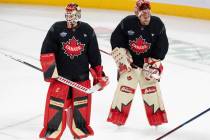 Canada goaltenders Sam Montembeault, left and Adin Hill skate during practice for the 4 Nations ...