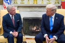 President Donald Trump speaks with Jordan's King Abdullah II in the Oval Office at the White Ho ...