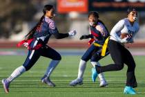 Sierra Vista receiver Danielle Livingston (32) secures a catch against Coronado defensive back ...