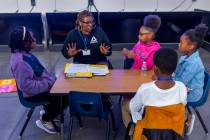 Teacher Tracey Warren works with second graders as the Southern Nevada Black Educators Initiati ...