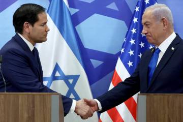 U.S. Secretary of State Marco Rubio, left, and Israeli Prime Minister Benjamin Netanyahu shake ...