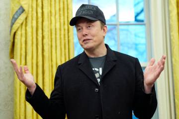 Elon Musk speaks during an event with President Donald Trump in the Oval Office at the White Ho ...