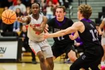 Mater East point guard Miles Williams (4) passes the ball to a teammate during a class 3A semif ...