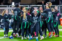 Palo Verde teammates celebrate after their 5A flag football championship game win against Deser ...