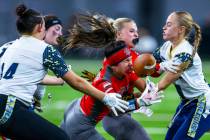 Arbor View running back Danielle Morales (3) loses the ball after a run as Foothill defensive b ...