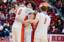 Bishop Gorman teammates celebrate winning a class 5A boys basketball state championship game be ...