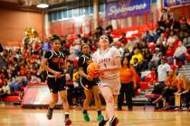 Legacy's Alabama Nieves (1) drives to the basket for a layup during a Class 4A girls basketball ...