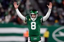 FILE - New York Jets quarterback Aaron Rodgers (8) reacts after a touchdown pass during an NFL ...