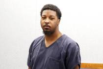 Devante Reynolds, one of the three defendants in bus stop killing, appears in court during a he ...