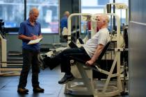 Dr. Grover Smith, right, works out with exercise scientist Dr. Irv Rubenstein, left, at STEPS F ...