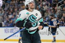 Seattle Kraken left wing Brandon Tanev (13) reacts to the St. Louis Blues’s win on Tuesd ...