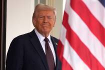 President Donald Trump stands before British Prime Minister Keir Starmer arrives at the White H ...