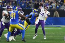 Los Angeles Rams linebacker Jared Verse (8) applies pressure to Minnesota Vikings quarterback S ...