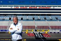 Las Vegas Motor Speedway president Chris Powell, standing about the third floor balcony of the ...