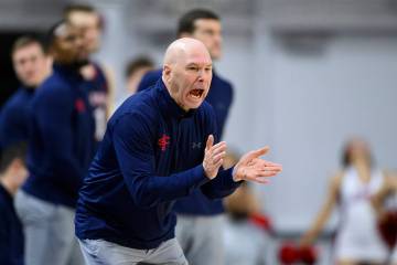 Saint Mary's head coach Randy Bennett reacts after the team scores during the second half of an ...