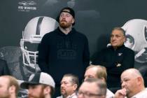 Raiders defensive end Maxx Crosby, left, attends a press conference where the new Raiders gener ...